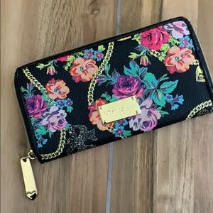 Betsy Johnson used wallet